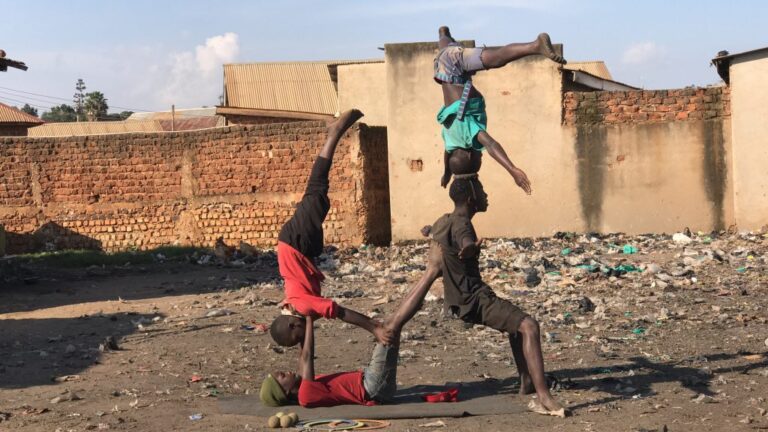 Bwengula Circus kids doing a trick